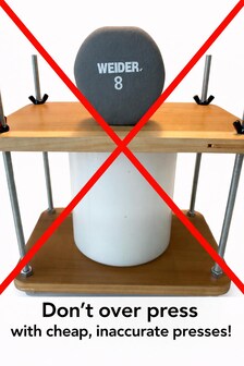 A basic press using weights and wing nuts is inaccurate.